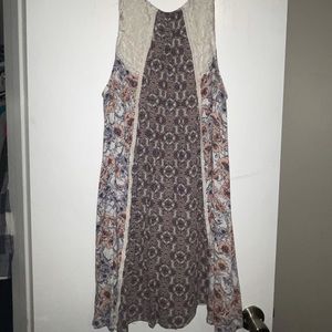 Women’s dress button on back is broke